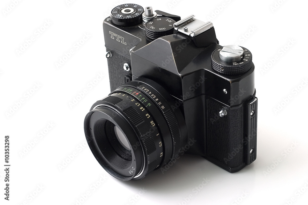 Fototapeta premium Old film camera isolate on a white background