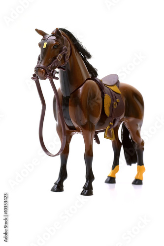 A horse with a saddle and an occasion on a white background