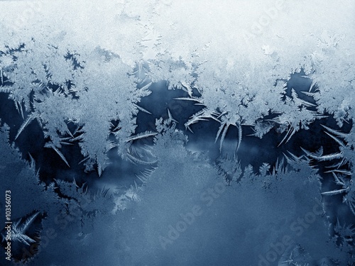 Frosty pattern on window in winter season