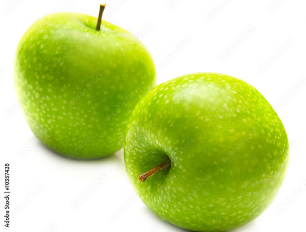 Green apples on the white background. Isolated. Green apples on the white background. Isolated.