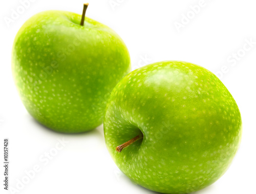 Green apples on the white background. Isolated.