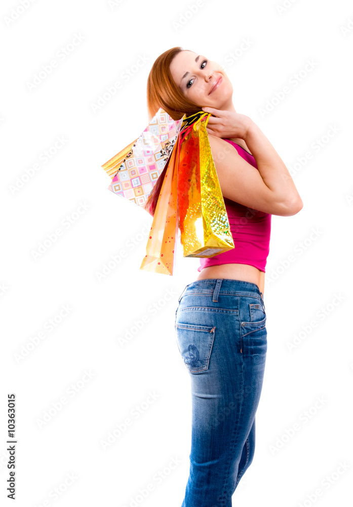 attractive girl  holding in hands multi-coloured bags
