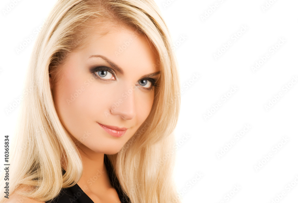 Beautiful woman face smiling. Isolated on white Beautiful woman face smiling. Isolated on white