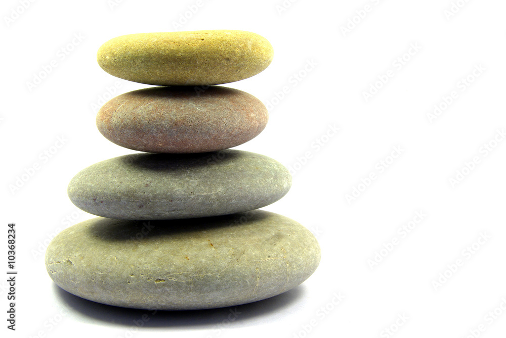 Close-up view on a pyramid of four pebbles Close-up view on a pyramid of four pebbles