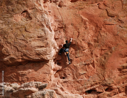 Climbing a Sandstone Ledge