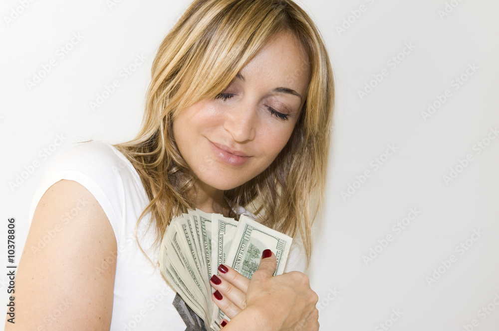 Attractive woman takes lot of 500 euro banknotes. Attractive woman takes lot of 500 euro banknotes.