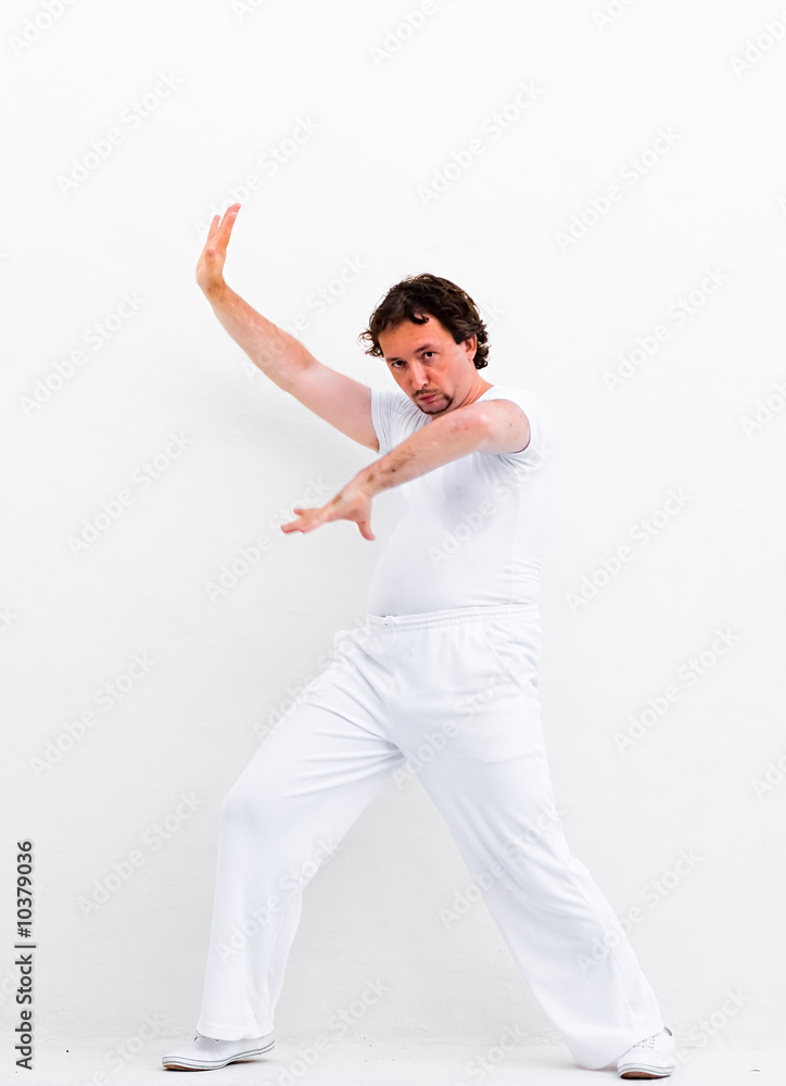 man practicing asian martial art man practicing asian martial art