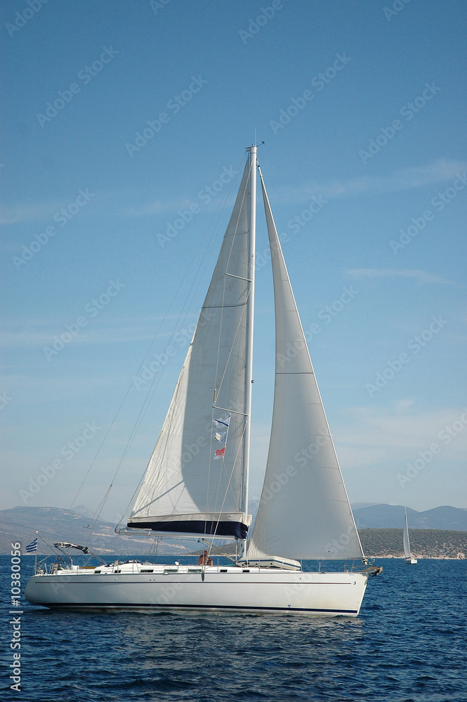 white yacht sail in the sea