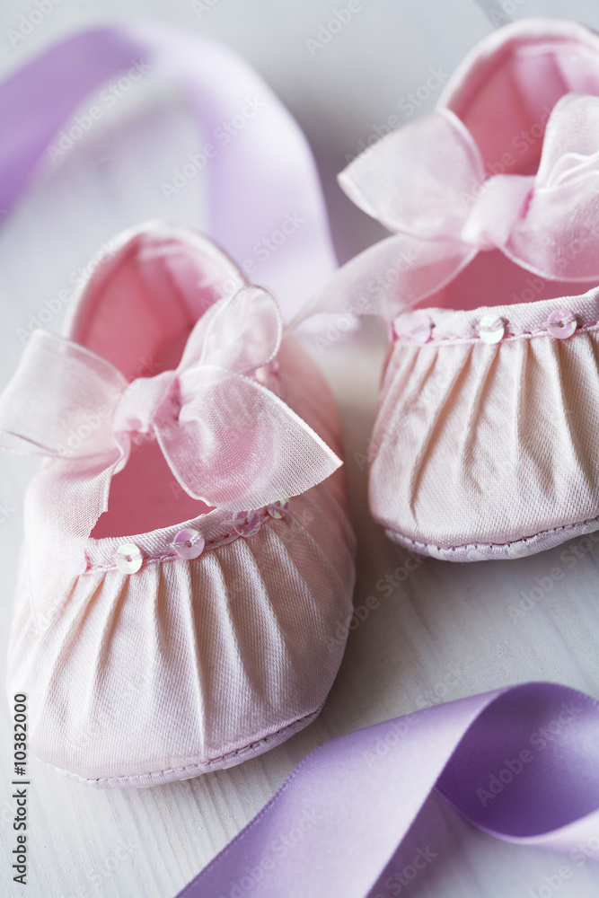 closeup pf satin baby shoes closeup pf satin baby shoes