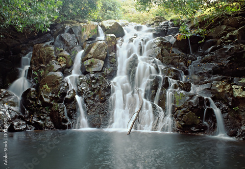 Small jungle waterfall with pool in Africa
