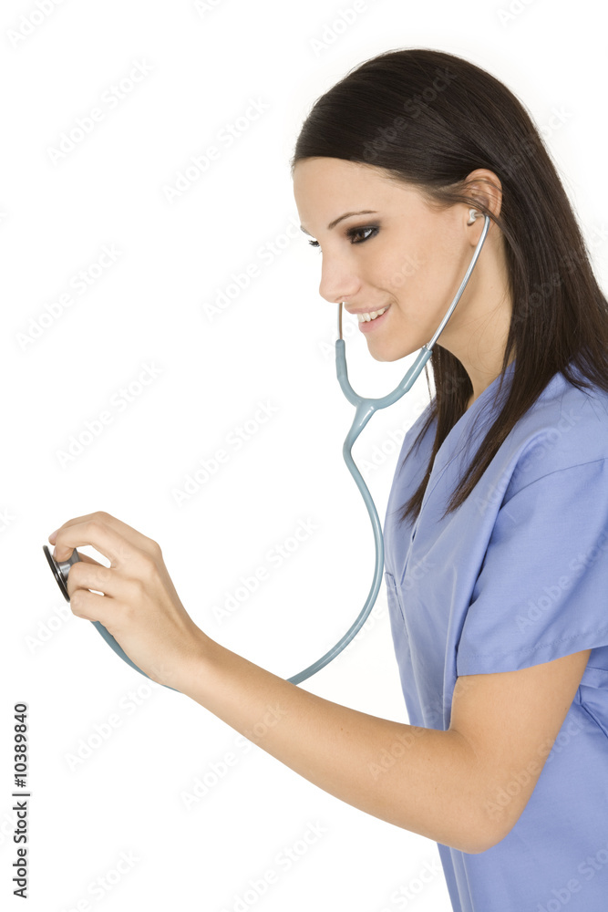 Beautiful Caucasian doctor / nurse standing on white background Beautiful Caucasian doctor / nurse standing on white background