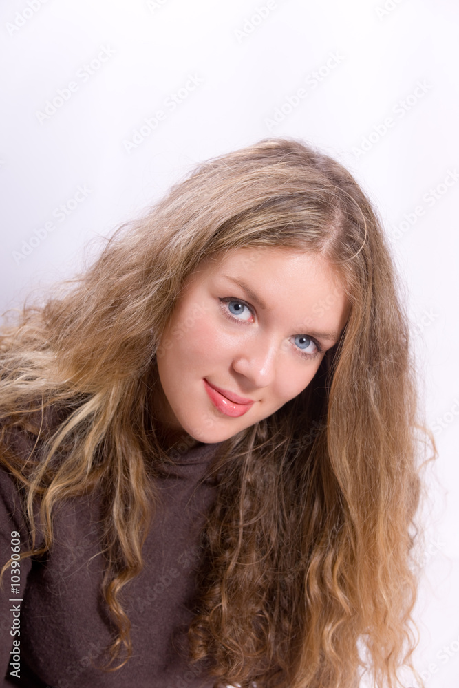 Portrait of the young beautiful blonde with long hair Portrait of the young beautiful blonde with long hair