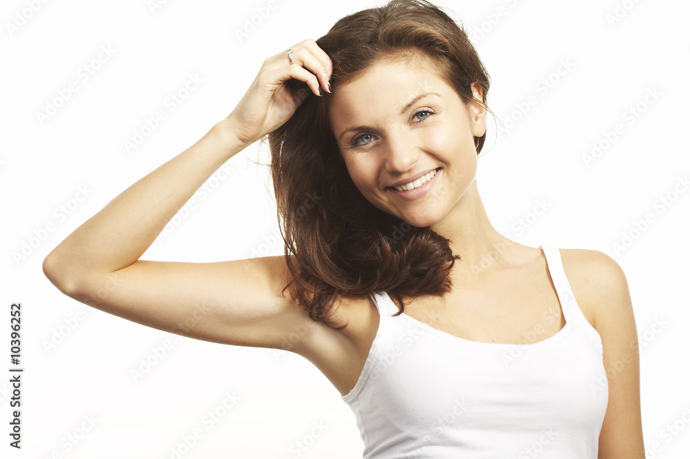 A happy young woman with facial expression on white background A happy young woman with facial expression on white background