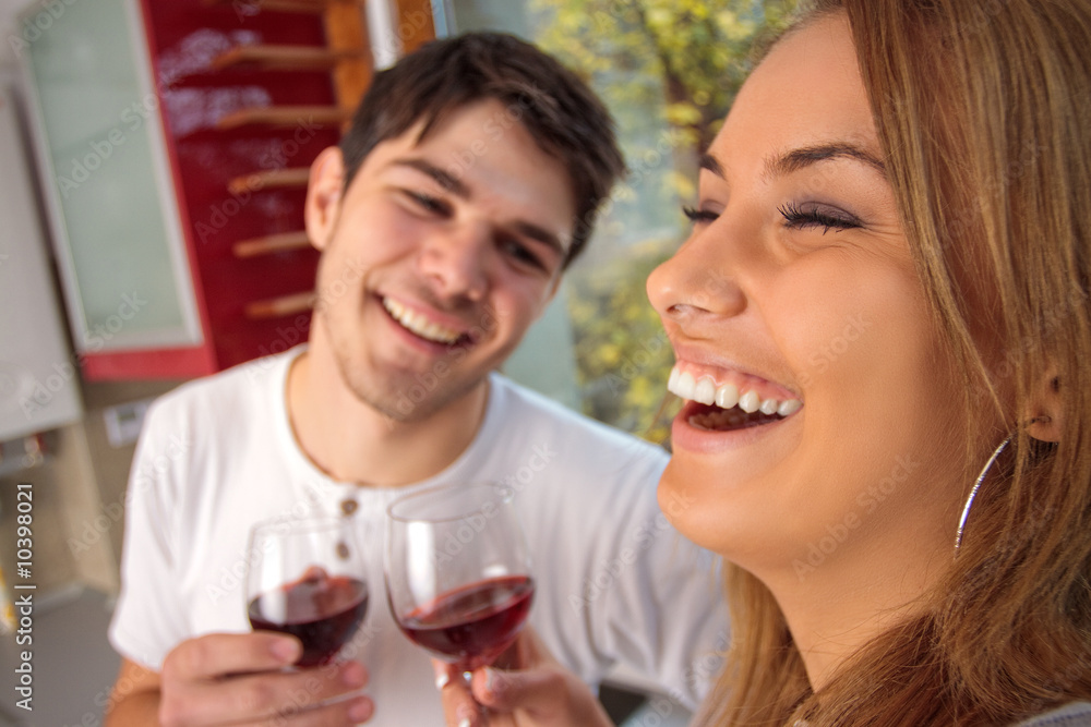 Happy young couple drinking wine Happy young couple drinking wine