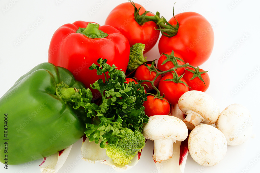 Pile of vegetables isolated on white Pile of vegetables isolated on white