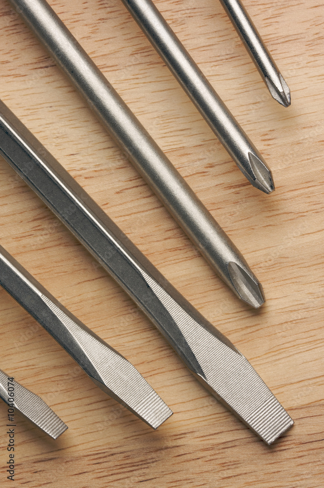 Series of Screwdrivers on a Wood Background. Series of Screwdrivers on a Wood Background.