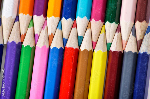 Writing materials: coloured pencils background.
