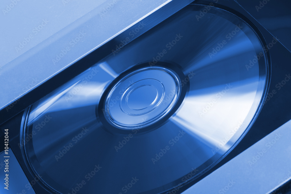 Computer disk. A photo close up a disk in a drive Computer disk. A photo close up a disk in a drive