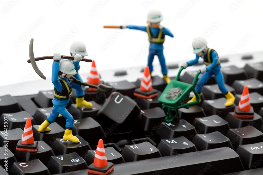 computer repair concept - workers repairing keyboard computer repair concept - workers repairing keyboard
