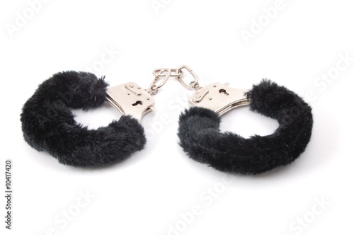 some handcuffs isolated on a white background