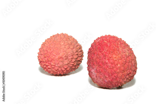 two litchi on a white