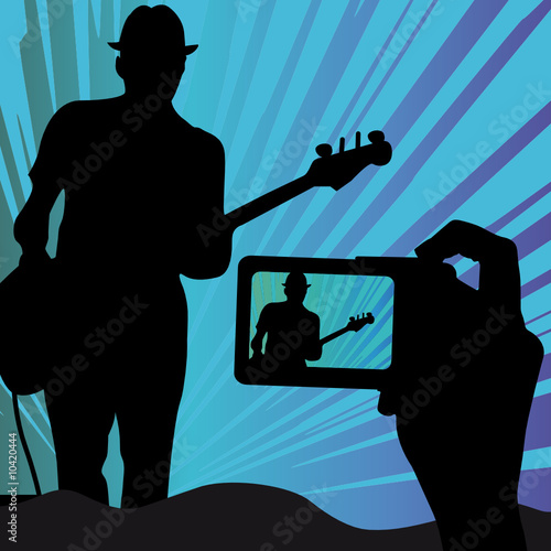 Konzert Scene mit Digitalkamera und Gittarenspieler