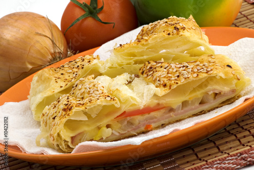Salty ham strudel with sesame,cheese and vegetables
