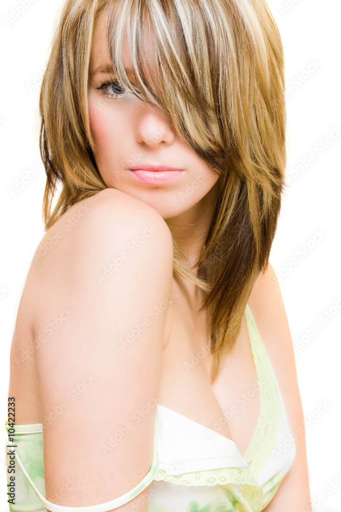 Naklejka premium Close up portrait of a sexy blonde woman isolated on white