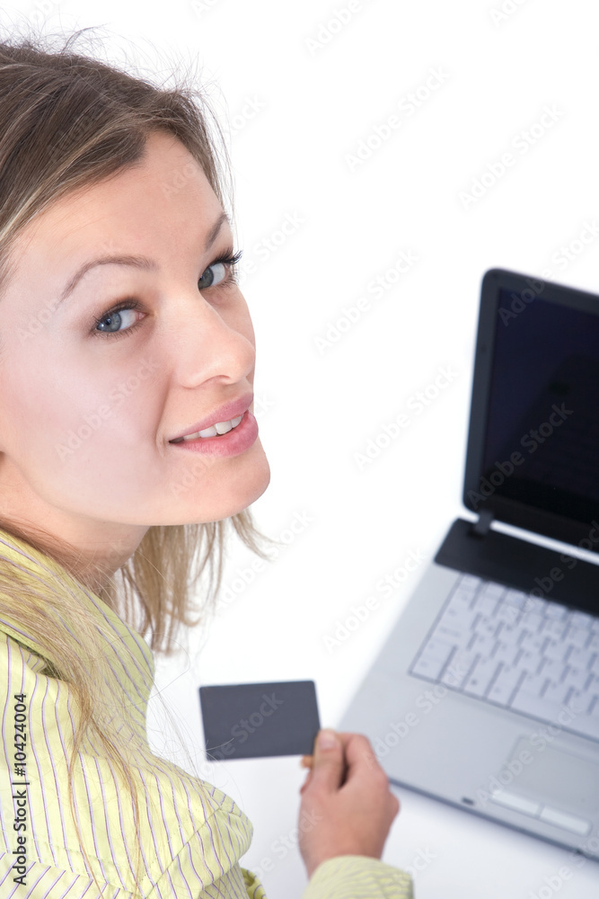 beautiful woman with a modern laptop and credit card beautiful woman with a modern laptop and credit card