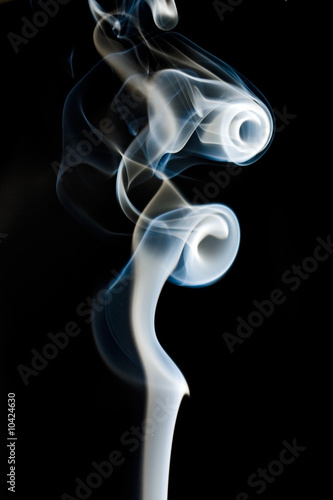 Fototapeta Naklejka Na Ścianę i Meble -  Abstract smoke background a over black background