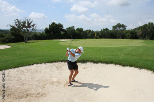 Golf - Schlag aus dem Sandbunker