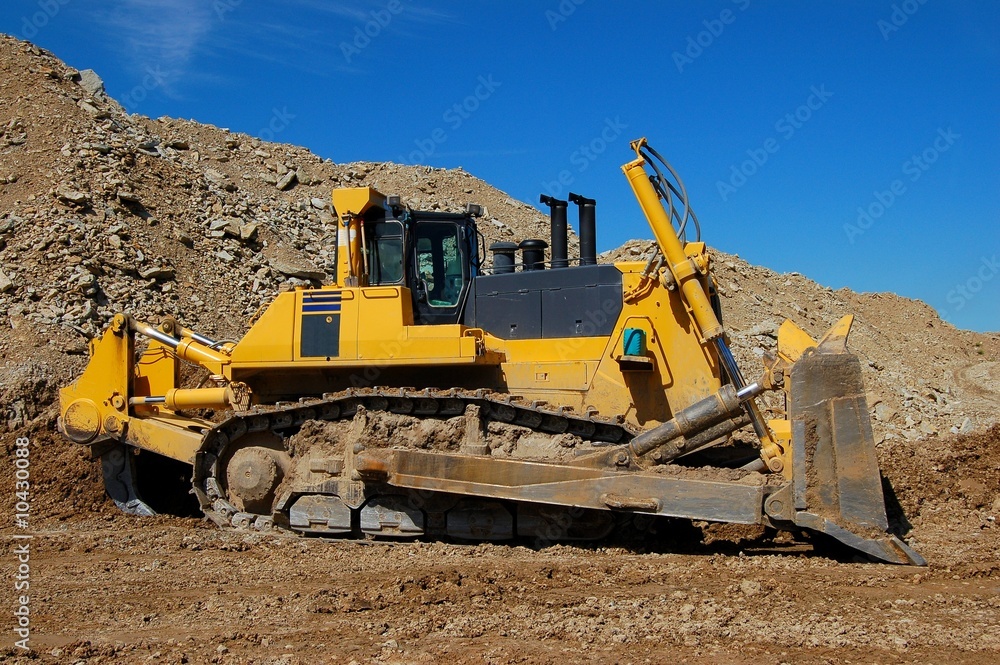 Obraz premium Bulldozer in open pit