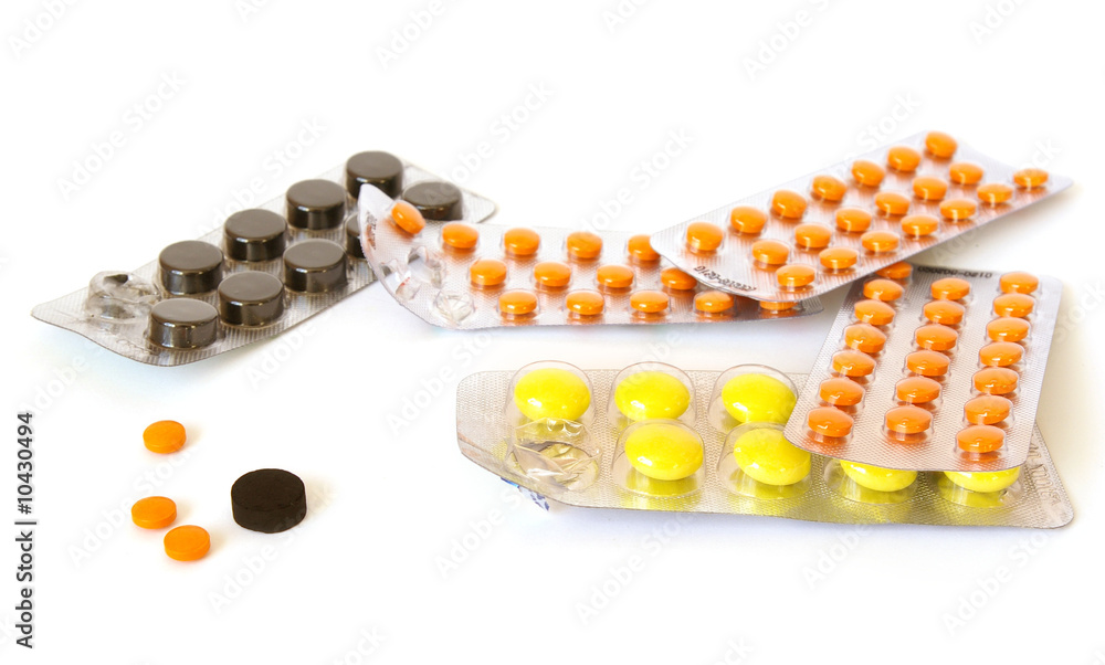 Group of colorful pills isolated on white Group of colorful pills isolated on white