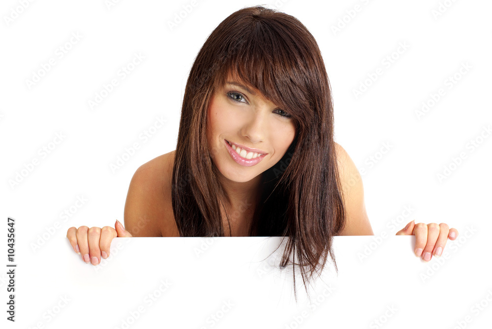beautiful smiling girl holding a blank billboard. beautiful smiling girl holding a blank billboard.