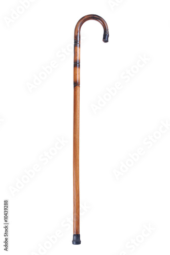 Wooden cane isolated on white background photo