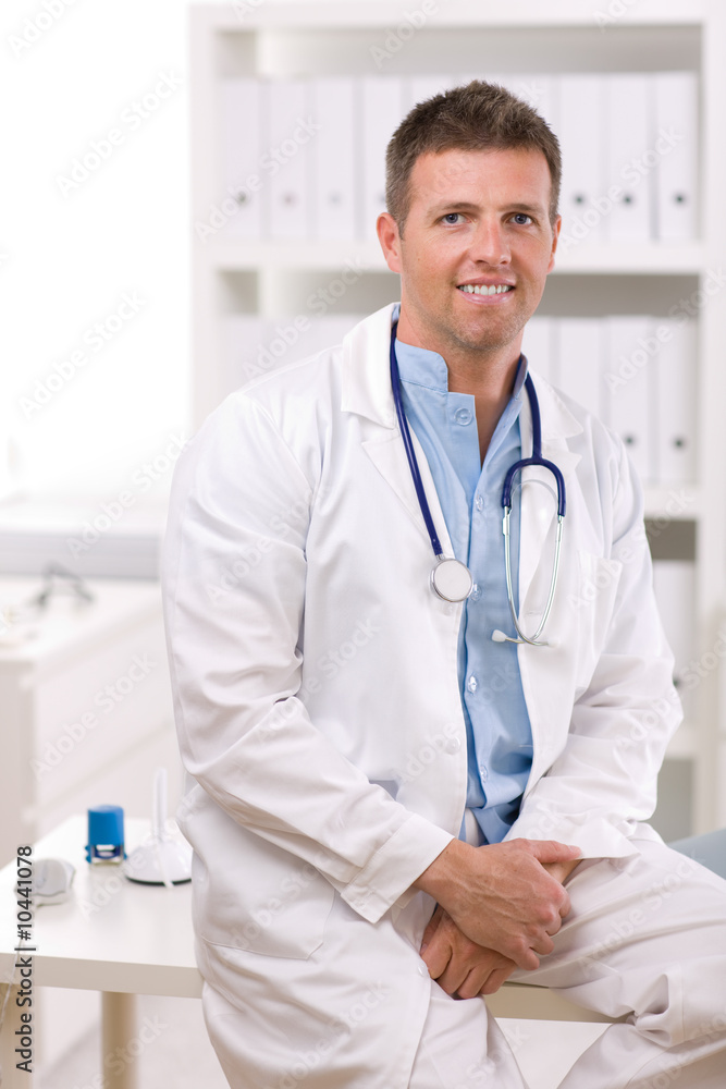 Portrait of medical professional at doctors room. Portrait of medical professional at doctors room.