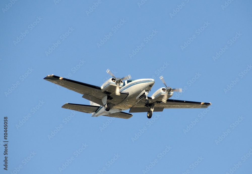 Twin engine turboprop airplane apporoaching Twin engine turboprop airplane apporoaching