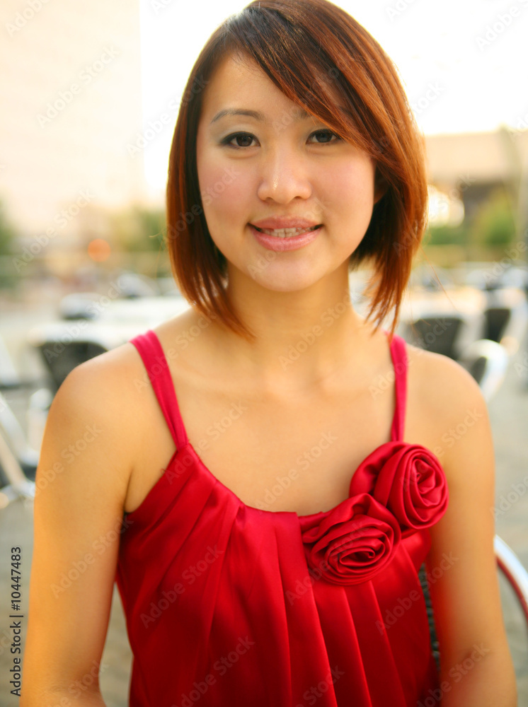 close up of pretty asian young asian girl in red dress close up of pretty asian young asian girl in red dress