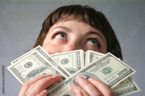 Woman with hand of money