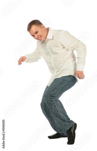 Young man in white shirt dancing
