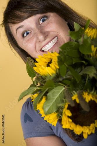 Smiling Girl with Sunflowers