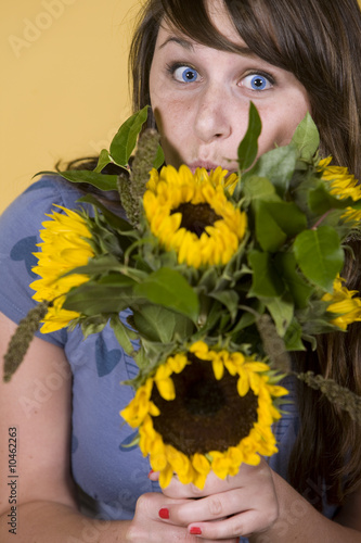 Smiling Girl with Sunfowers