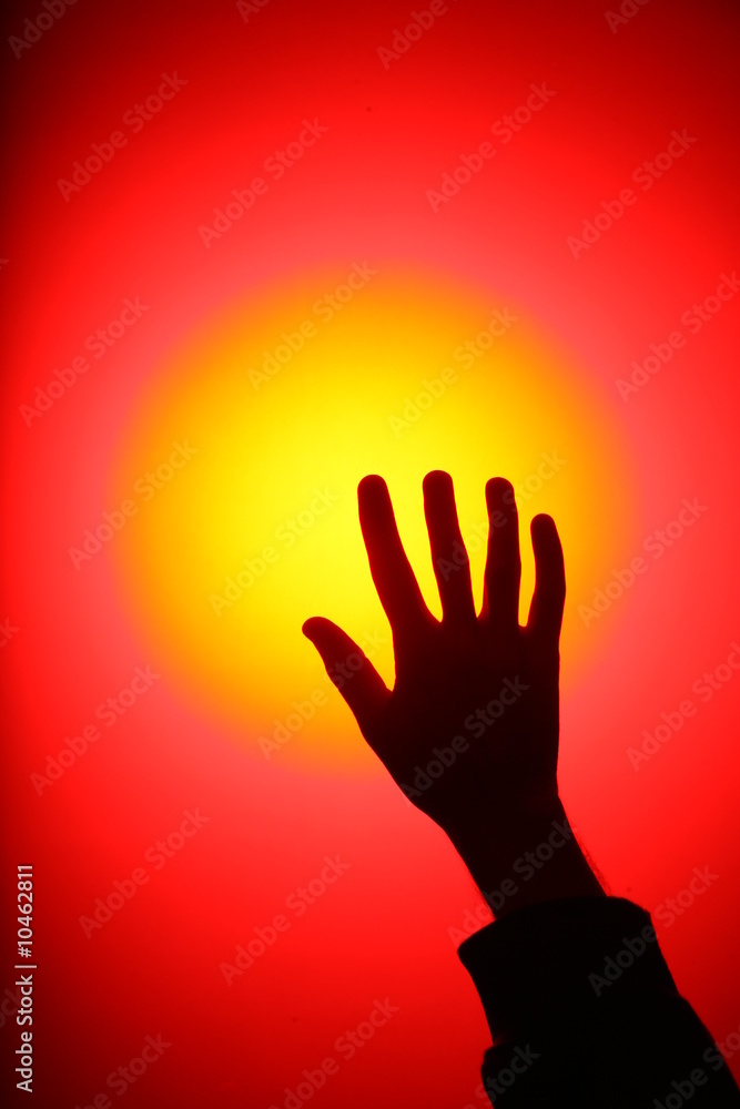Hand reaches helping light