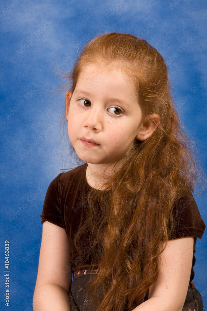 Naklejka premium Meditation Portrait of redhead young girl with long hair