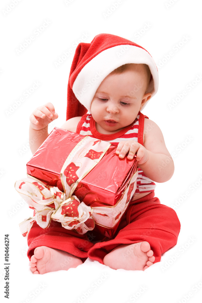 Surprised baby boy in santa claus hat on white background Surprised baby boy in santa claus hat on white background