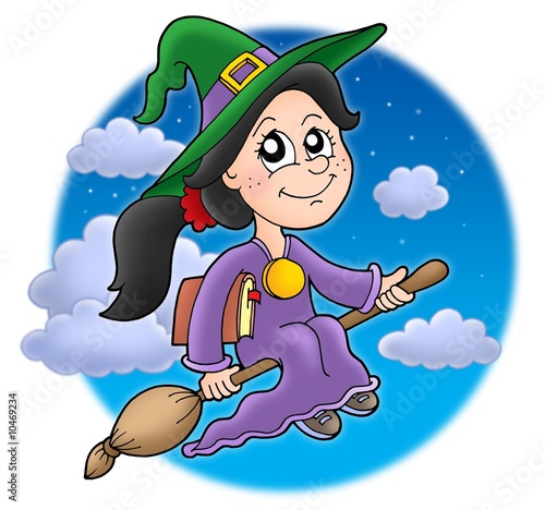 Cute witch on broom photo