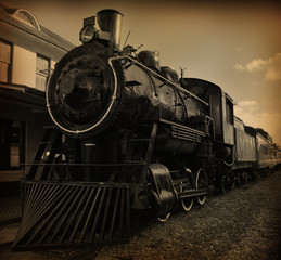 Fotobehang Trein Sepia stoomtrein in nostalgische sfeer  © Faded Beauty