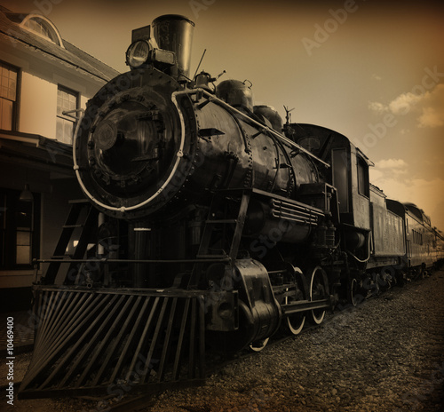 Sepia toned shot of old fashioned steam train