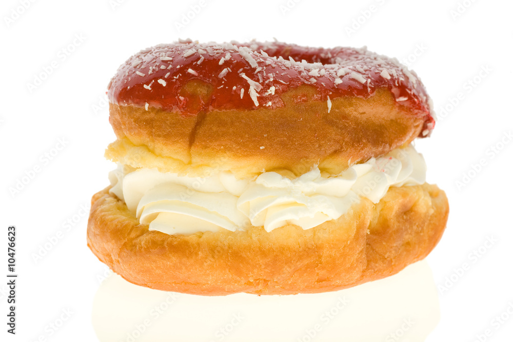 Puff cake with cream over white background Puff cake with cream over white background