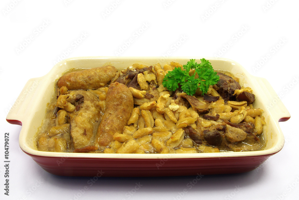 Studio shot of a cooked cassoulet in its dish Studio shot of a cooked cassoulet in its dish
